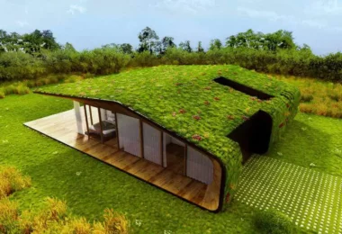 Une magnifique maison au toit végétalisé qui se confond parfaitement avec le paysage
